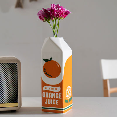 Piccolo vaso da tavolo idroponico in ceramica in arancione ideale per casa e ristorante