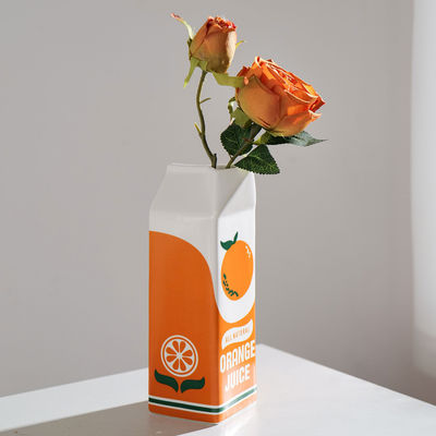 Piccolo vaso da tavolo idroponico in ceramica in arancione ideale per casa e ristorante