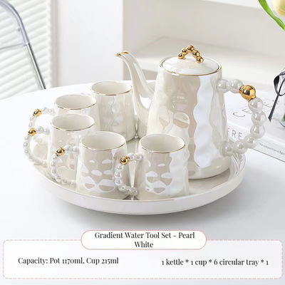 Moderno set di tazze di tè in ceramica rosa di lusso con disegno di conchiglia e piatto per il tè pomeridiano