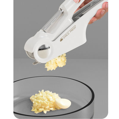 Macchine e tagliatrici di aglio multifunzione in acciaio inossidabile 4 in 1 con utensili per l'apertura delle lattine