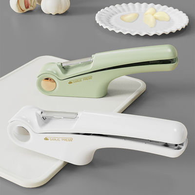 Attrezzi da cucina durevoli 4 in 1 Macinatore di aglio in acciaio inossidabile e tagliatore con apritore di lattine