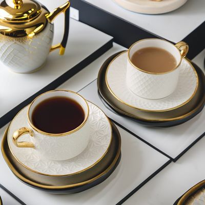 Coppe e piatti in ceramica bianca moderna Nordic Elegant Bone Cup Set per tazze d'acqua