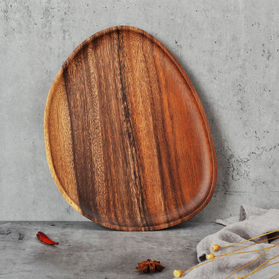 Arricchisci la tua tavola con piatti e vassoi di frutta di legno fatti a mano