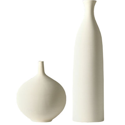 Vaso di ceramica bianca moderno e elegante per l'arredamento del soggiorno e le composizioni floreali fresche
