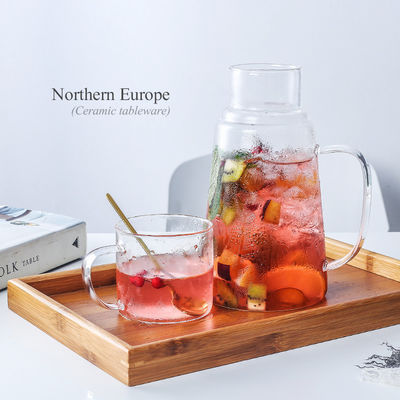 Moderno Disegno Bottine d'acqua calda/fredda Succhi di bevande Carafe Bottine di vetro Set con tazza