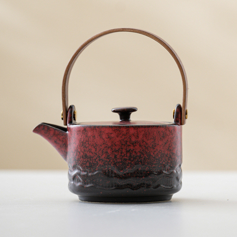 Elegante Set di tè in ceramica a vaso singolo con design a trazione sostenibile e compatto