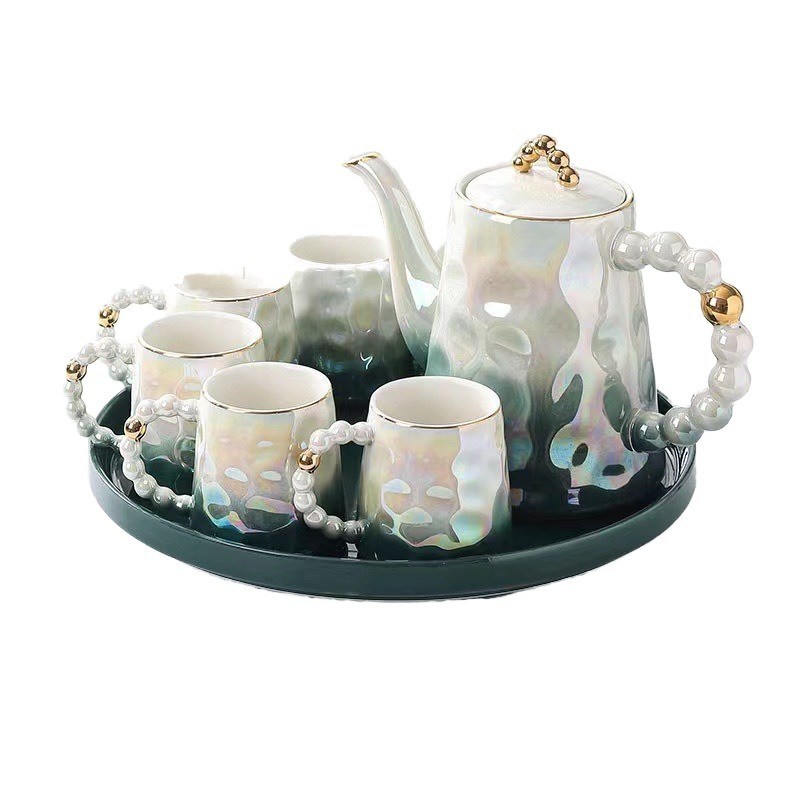 Moderno stile Materiale di bambù in ceramica rosa a forma di conchiglia Tazza e piatto per il tè pomeridiano